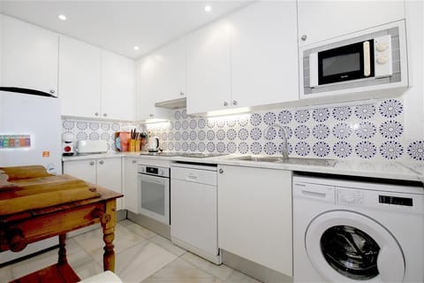 Spacious kitchen is fully equipped with all the appliances