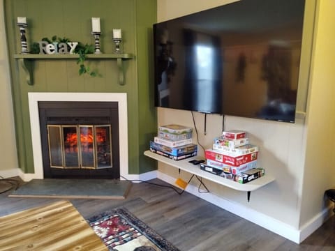 Game on! Lounge on the plush pull-out sofa, binge your favorite shows on the big Roku TV, or enjoy game nights by the electric fireplace. Perfect spot for lazy evenings!