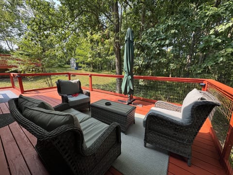Outdoor deck with grill for lounging and chatting. Smoking allowed on this deck.