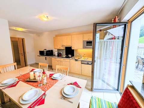 Table, Property, Furniture, Tableware, Cabinetry, Wood, Dishware, Interior Design, Plate, Flooring