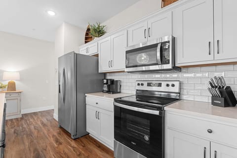 Enjoy stainless steel appliances in this beautiful kitchen!