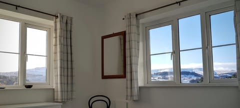 Bedroom One double aspect views towards Pen y Fan