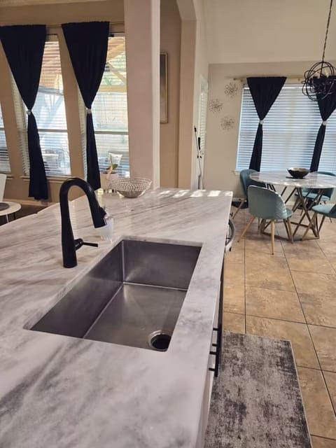 Nice deep sink and dishwasher on kitchen island. 