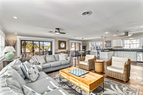 Upstairs living area from the living room. The dining and kitchen is in the background.