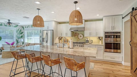 Cook like a pro in our fully stocked chef's kitchen! Featuring high-end appliances, cookware, and a chef’s pantry, this space has everything you need to whip up gourmet meals. Perfect for foodies, families, or anyone who loves to cook and entertain!