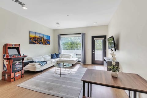 Curl up in the airy living room & stream your favorites on the smart TV