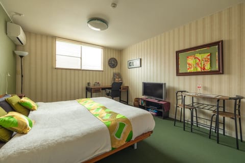 A multi-purpose room designed for rest, dining, or remote work