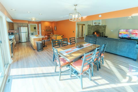View into kitchen and family room from dining area.