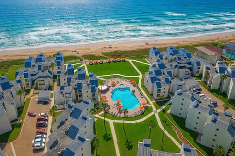 Oceanfront resort with stunning pool, direct beach access, and vibrant outdoor lounge areas. Perfect for families or groups seeking sun, surf, and relaxation—steps from the sand with panoramic views and upscale amenities.