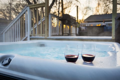 Soak, sip, and let go in the steamy tub