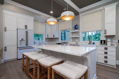 4 stools at the large kitchen island