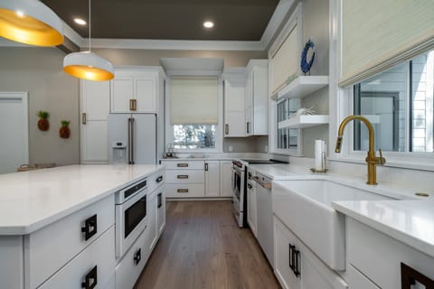 Custom cabinetry, Quartz counters, GE Cafe appliances