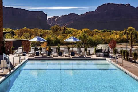 Soak up desert sunshine beside the pool and canyon views.