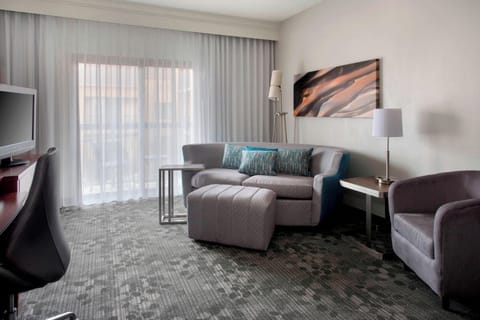 Relax on the roomy sofa and recharge by the window.