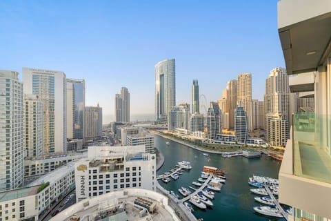 Panoramic Balcony View: Stunning skyline and marina views await from your private retreat!