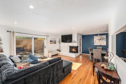 Relax in the cozy upstairs living room. 