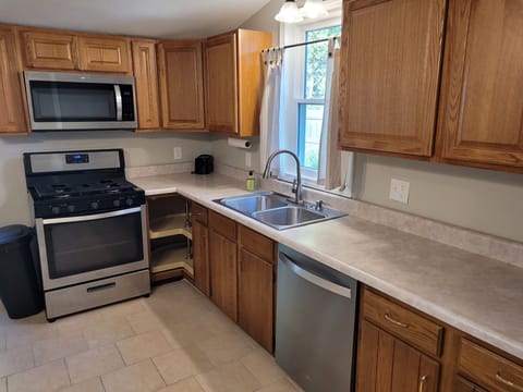 KITCHEN:  The home has a fairly large kitchen with all appliances including a dishwasher.  Also has a good supply of cooking and dining utensils.