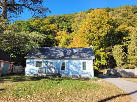 OVERALL:  The front of the house in the Fall with the Elberta Dunes in the background.