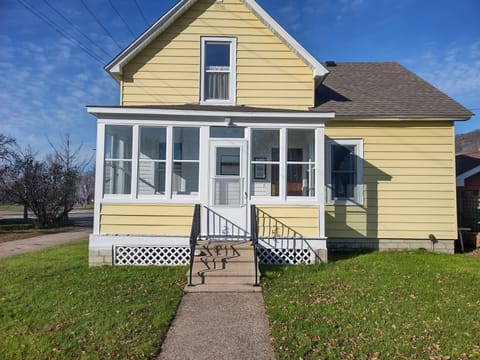 View of the back porch, great sitting area with the sun exposure during the day.