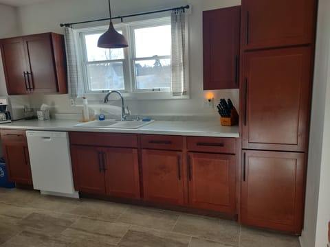 Fully equipped kitchen. Electric stove, microwave, dishwasher, drip coffee maker
