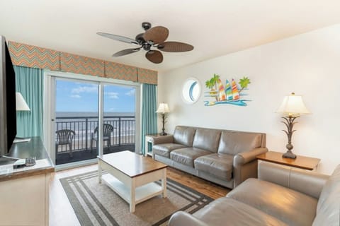 The ocean front living room is well-appointed with comfortable furnishings.