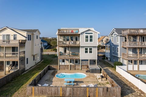 Life Is Still Good! Welcome home to this luxurious beach house. Equipped with 3 decks, all with ocean views, an in-ground pool + hot tub!