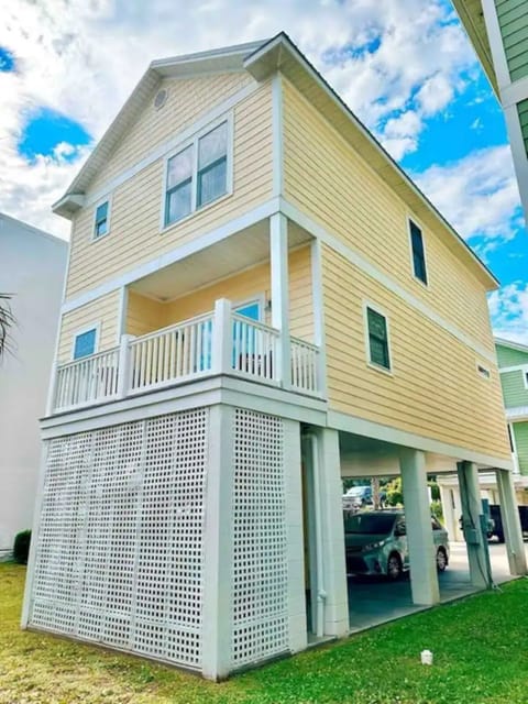 Spacious beach home with elevated porch and private entry