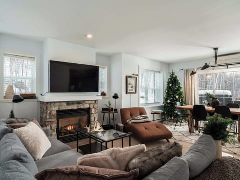 A warm living room where evenings by the fire feel unforgettable