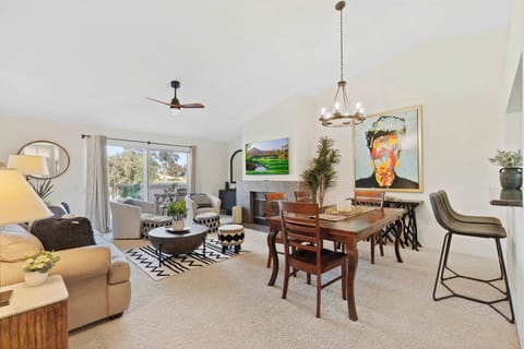 Unwind in the bright living area with golf course view