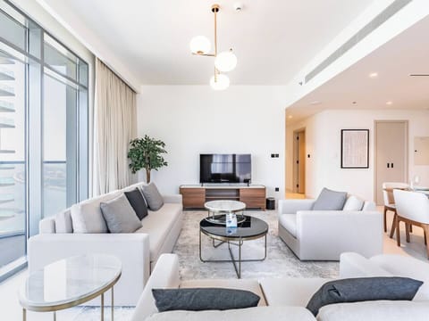 Bright and airy lounge space, complete with a large smart TV.
