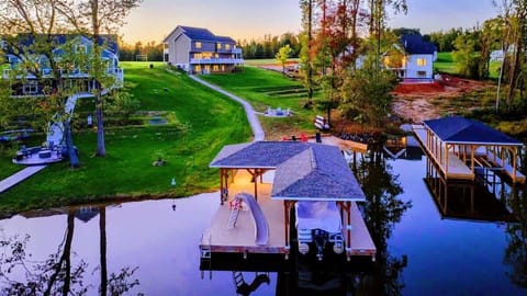 Relax at this serene lakefront property featuring a private dock, scenic views, and spacious accommodations for the perfect getaway.