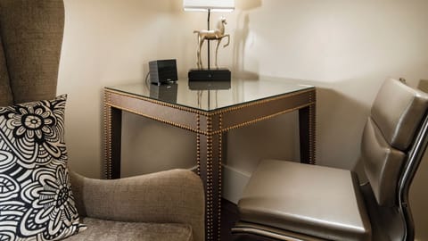 Settle in and plan your day at the chic desk.