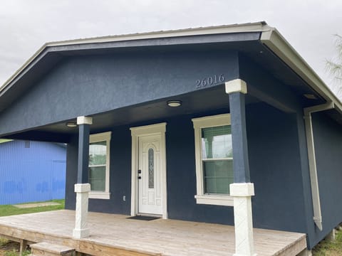 Front porch 10’ FT. Long by 24’ FT.  Wide