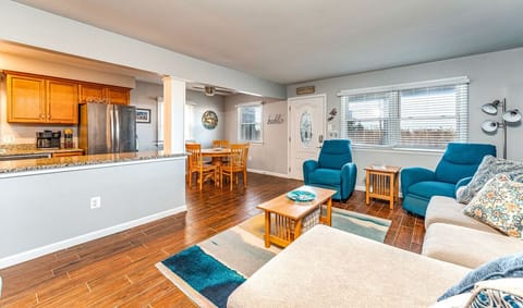 View of living room and kitchen area