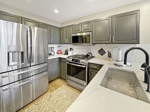 Wake up to your morning brew with the Nespresso machine or drip coffee maker. This kitchen comes fully stocked - blender for smoothies, toaster, tea pot, and all the accessories to fuel your mountain adventures