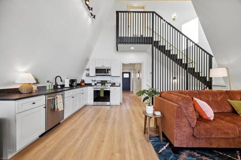 Main level - open concept living room, kitchen and dining