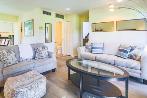 When you enter the front door, you will find the stairs, a bathroom, dining area and living room.