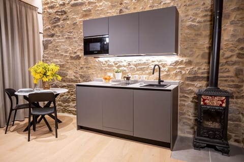 Kitchen, Interior Design, Kitchen Appliance, Countertop, Furniture, Cabinetry, Flooring, Home Appliance, Major Appliance, Home