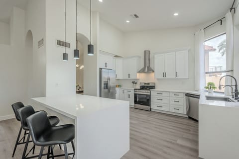 An open layout, ideal for cooking, dining, and gathering in a welcoming space