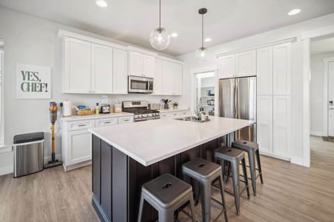 Stools with a large kitchen island to prepare your meals