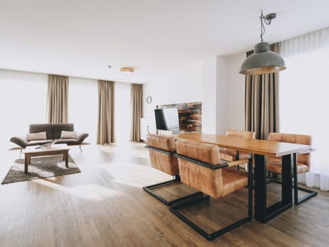 Living area in the holiday flat Apartments Goldbergblick by We Rent in Rauris.