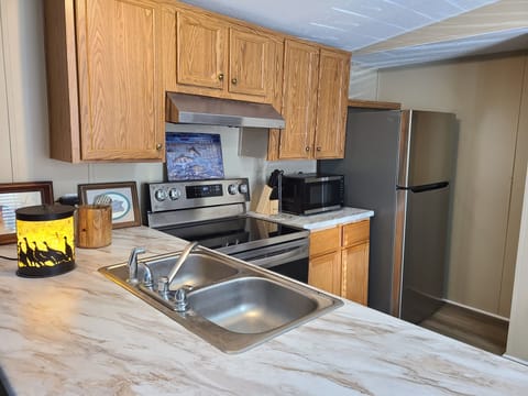 All new stainless appliances. Fridge has ice maker 