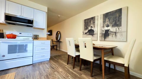 Fully stocked kitchen with dining for four. 