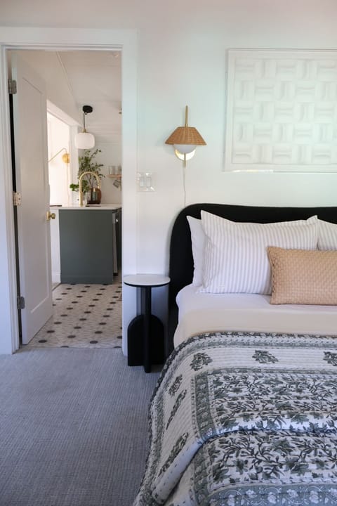 Bedroom adjacent to kitchen with great lighting!
