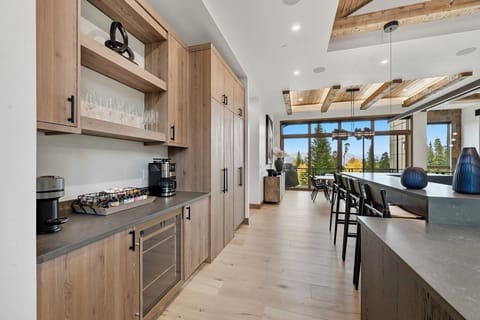 Coffee bar area next to hidden panty leading into dining room.