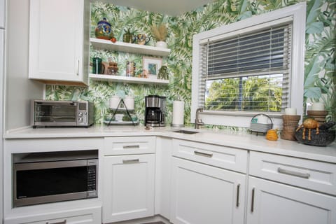 Tropical coffee bar— Wake up to your choice of French press, pour-over, or a 12 cup electric coffee maker. Morning vacation vibes are strong.