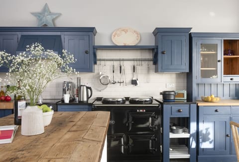 Henscath House, Mullion. Ground Floor: The kitchen is superbly equipped with everything you'll need during your stay, including this characterful electric aga