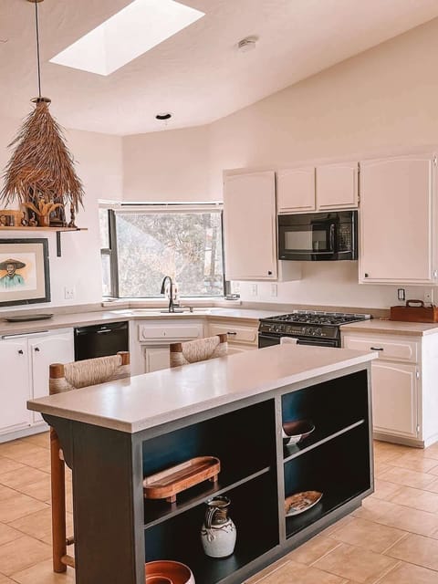 Fully stocked kitchen and breakfast bar