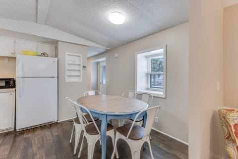 Gather around your bright dining space with room for six, complete with full kitchen access for memorable meals together.