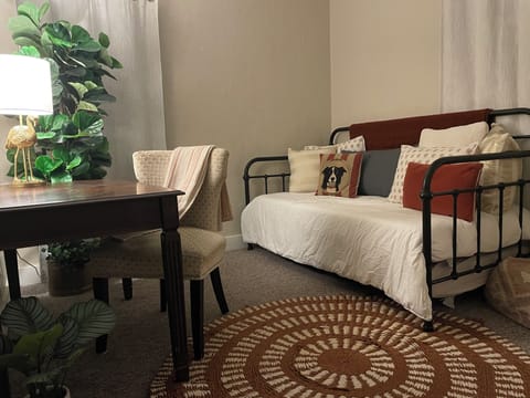 Second bedroom on main level features a  trundle & dedicated desk area. 